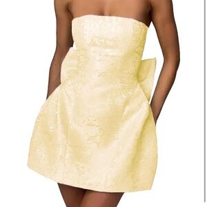 Short yellow bow dress